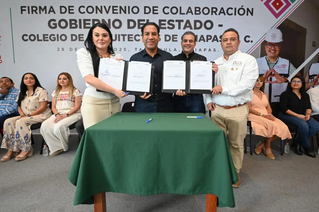 Group holding signed collaboration agreement documents.