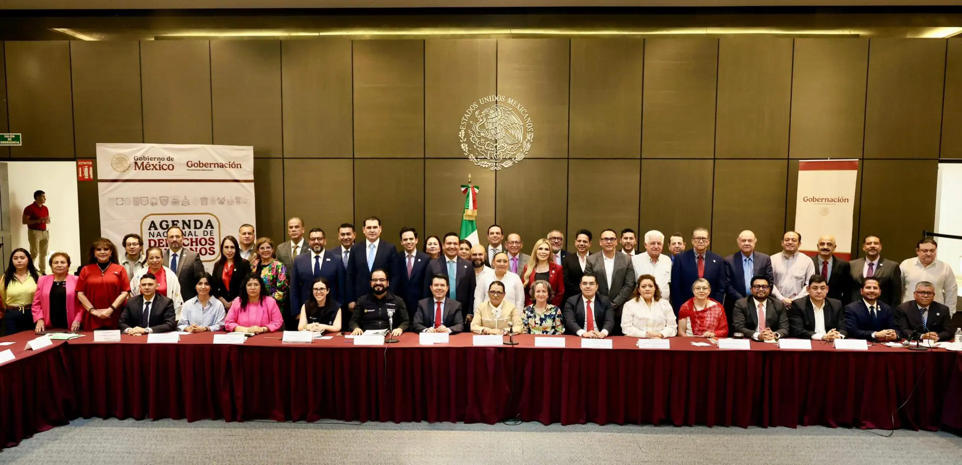 Group of people at a formal meeting.