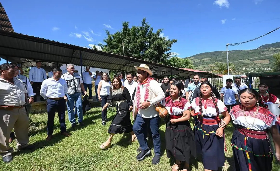 People dancing in traditional indigenous attire
