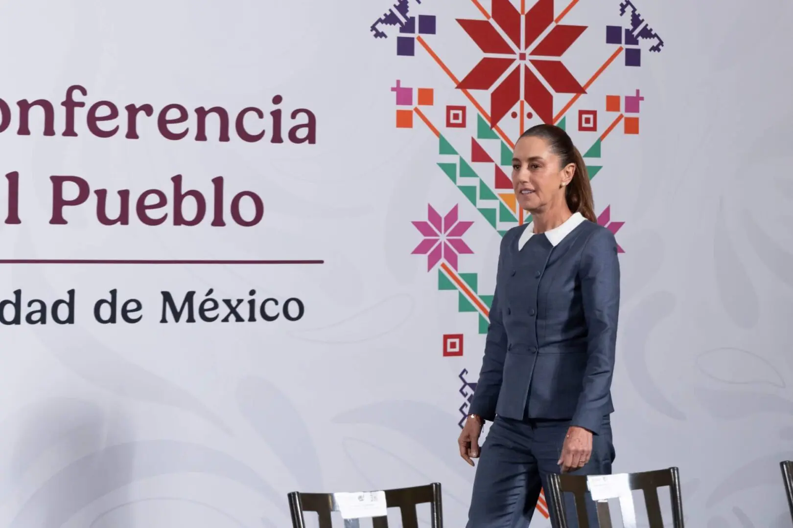 Woman at Mexico City conference stage