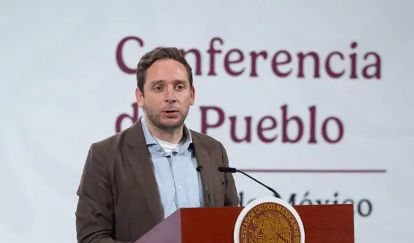 Male speaker at conference podium