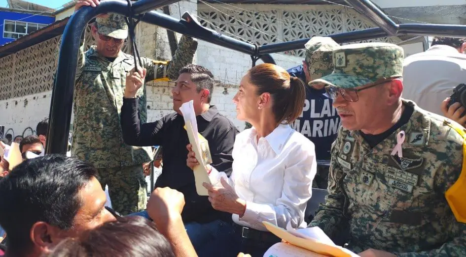 Woman handing papers amid uniformed soldiers