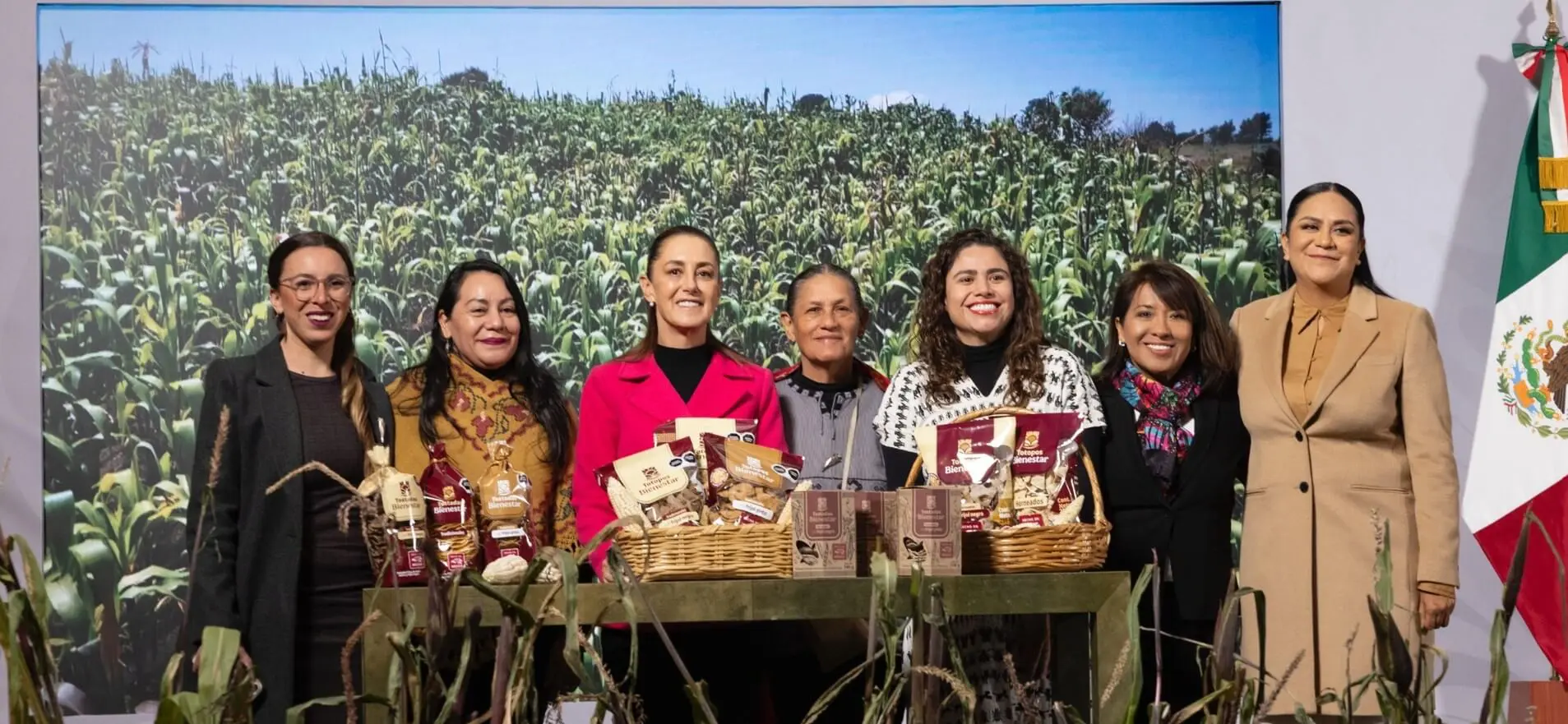 Seven women display artisanal corn products