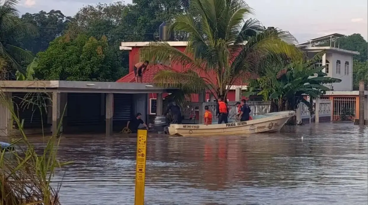 Boat evacuating residents from flooded neighborhood