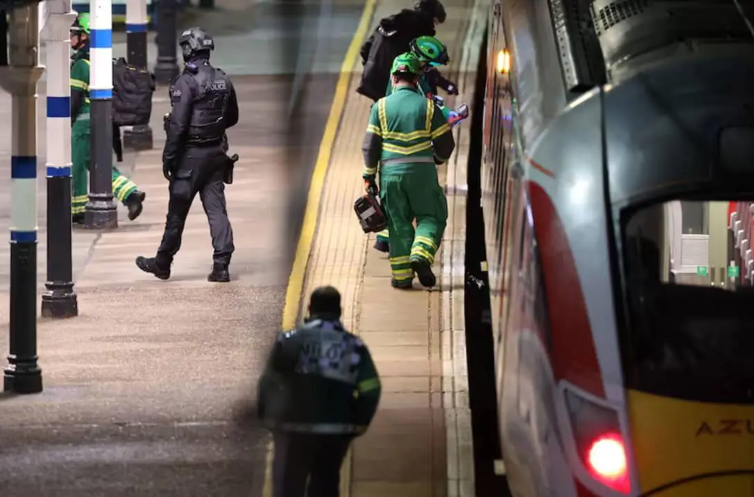 Paramedics and police at train station platform