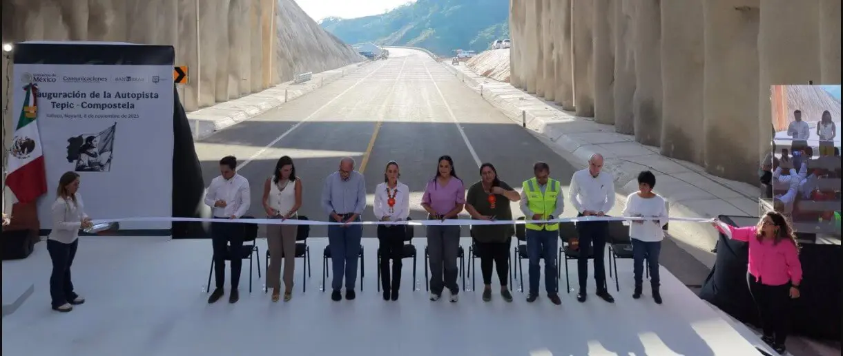 Officials ribbon-cutting at mountain highway opening