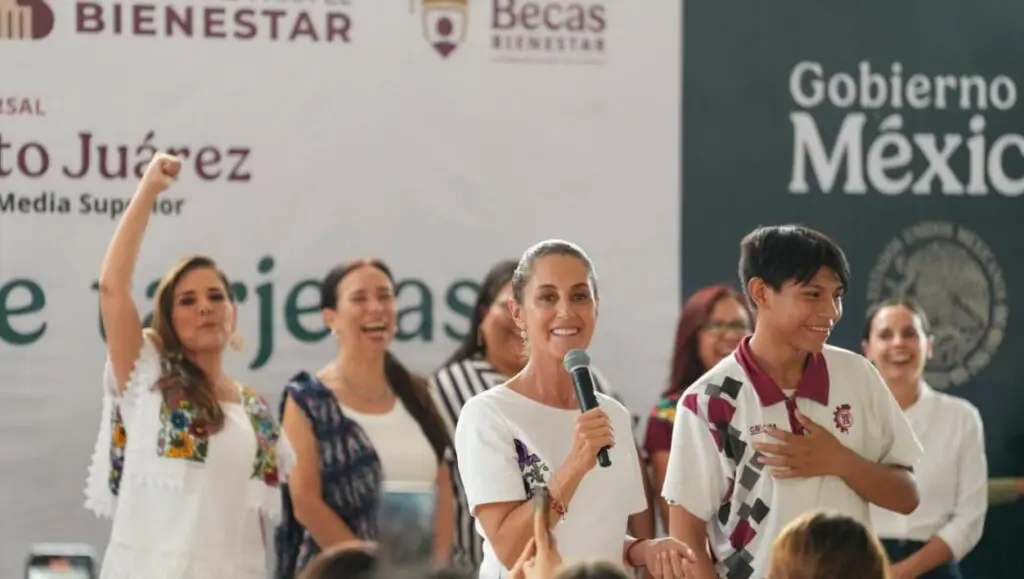 Smiling woman with microphone at community event