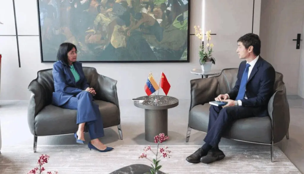 Diplomatic meeting with Venezuela and China flags
