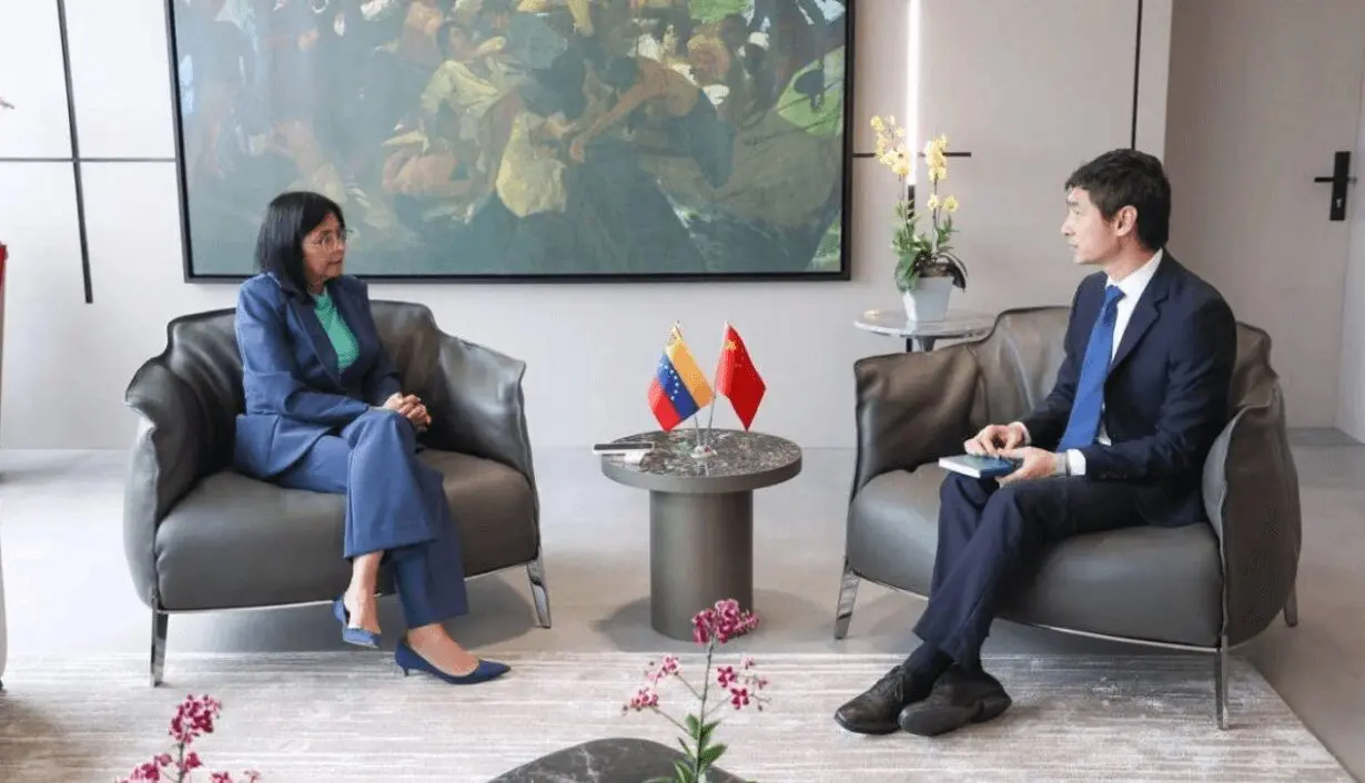 Diplomatic meeting with Venezuela and China flags