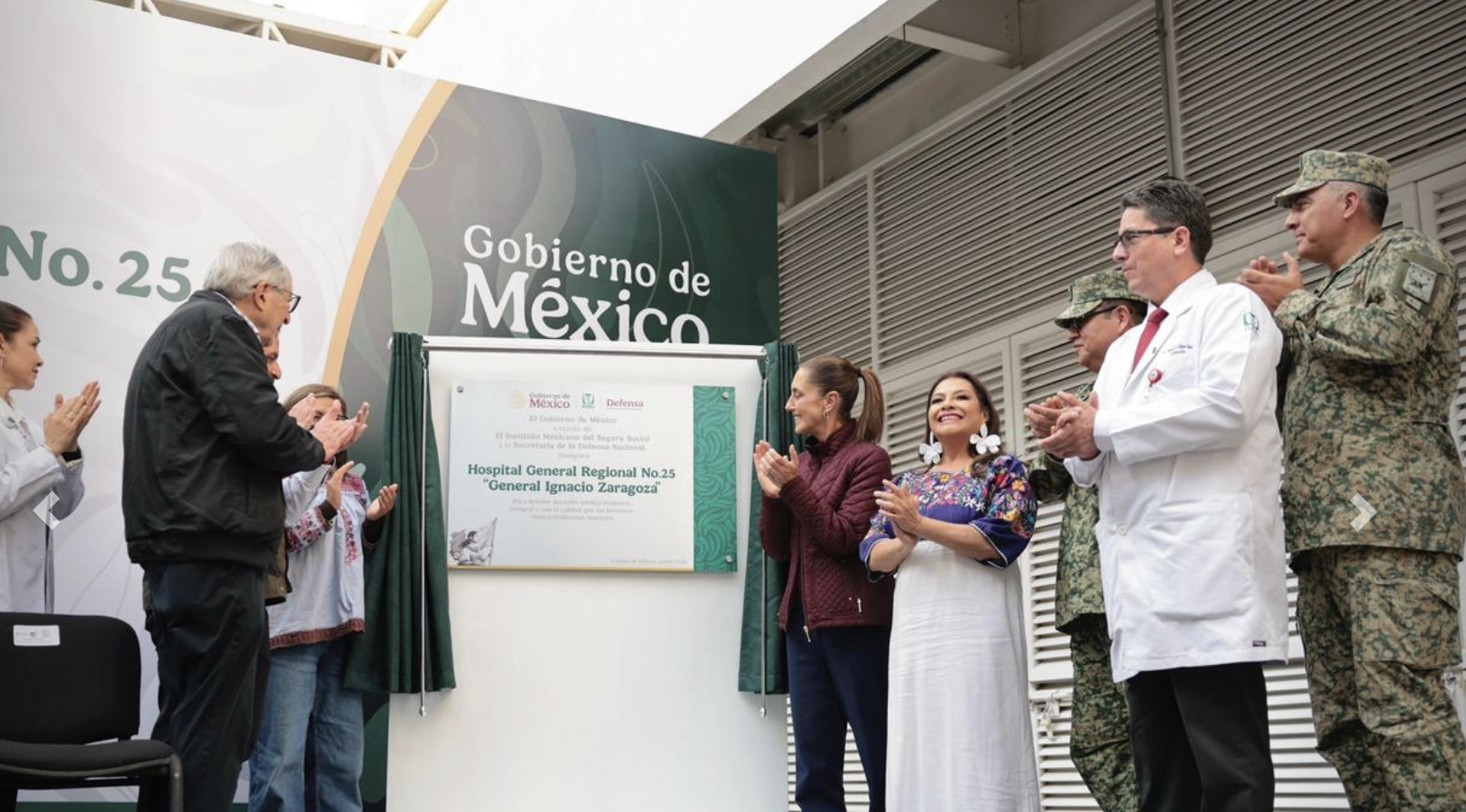 Mexican officials unveiling hospital plaque