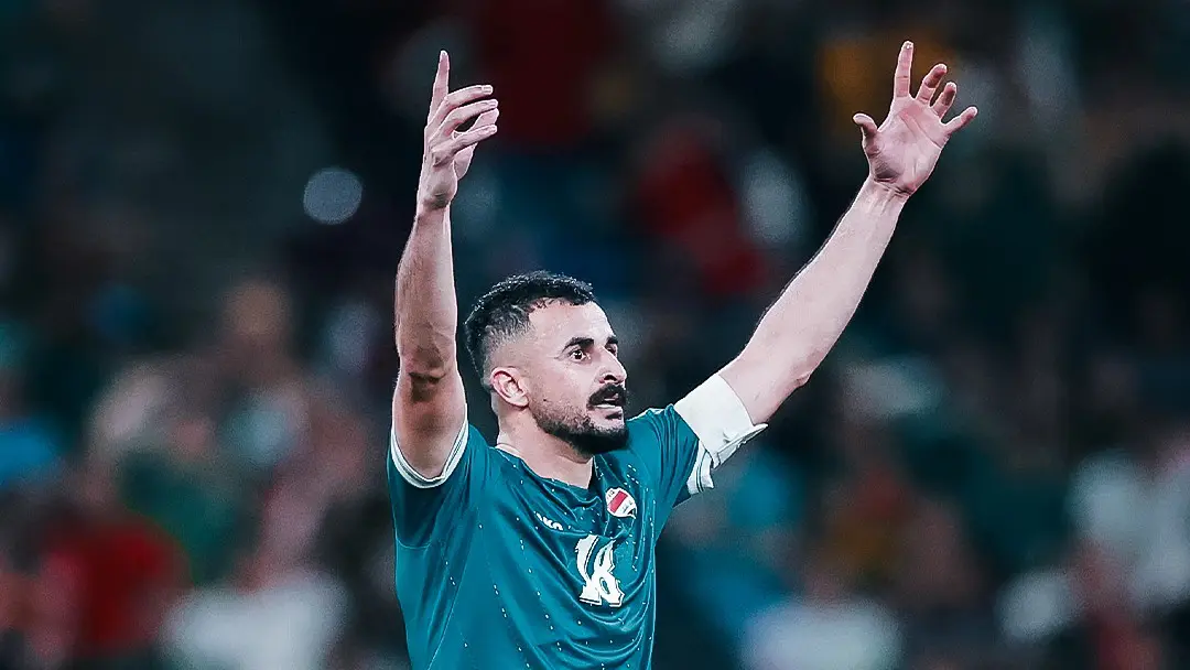 Aymen Hussein celebra el gol que califica a Irak al Mundial 2026.
