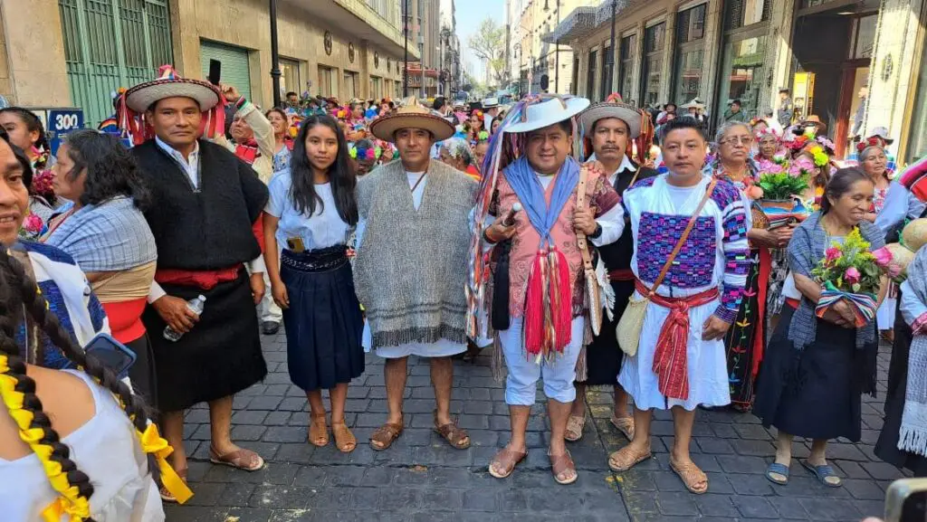 People in traditional indigenous dress at parade