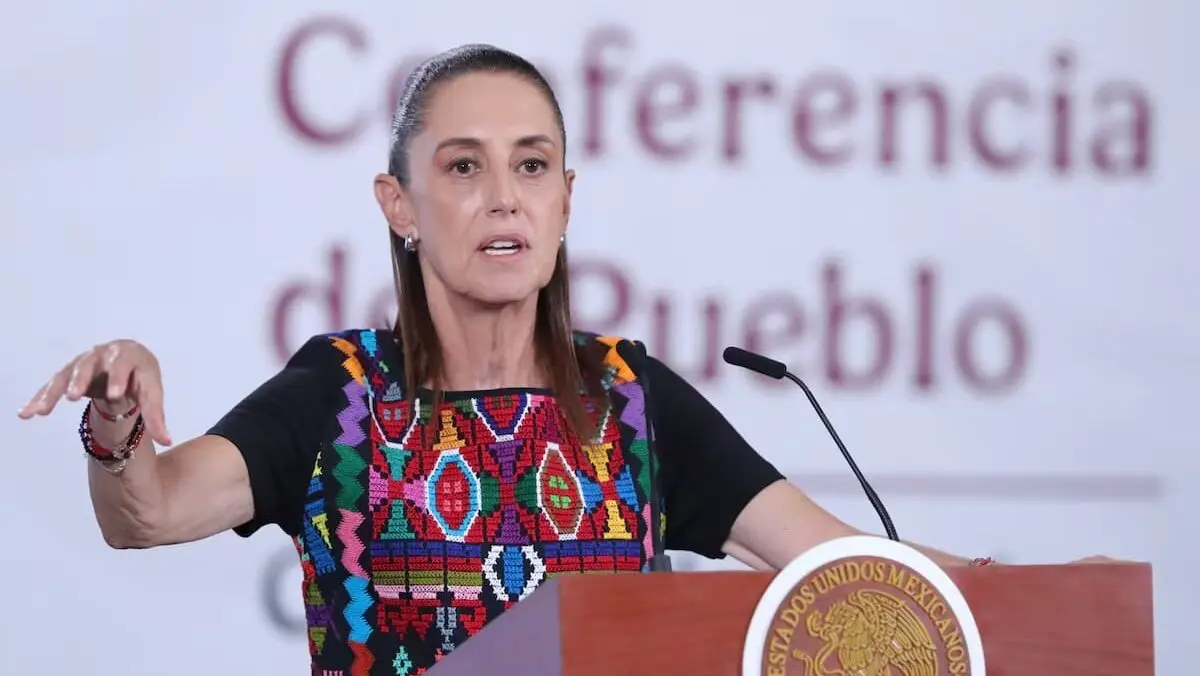 Woman speaking at podium during press conference