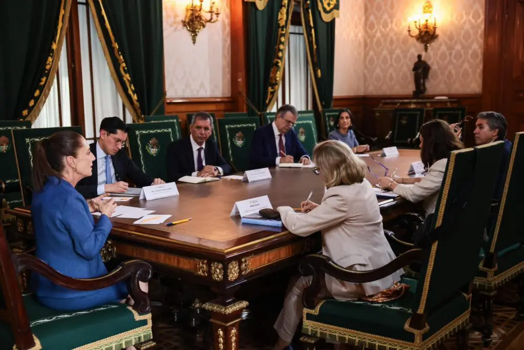 Officials meeting around ornate conference table