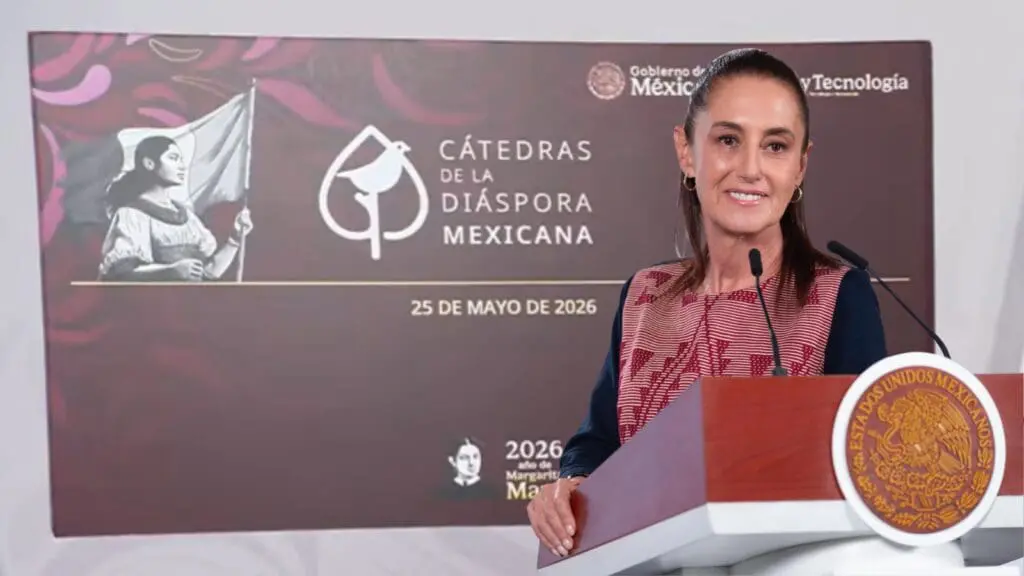 Woman speaking at Mexican diaspora podium