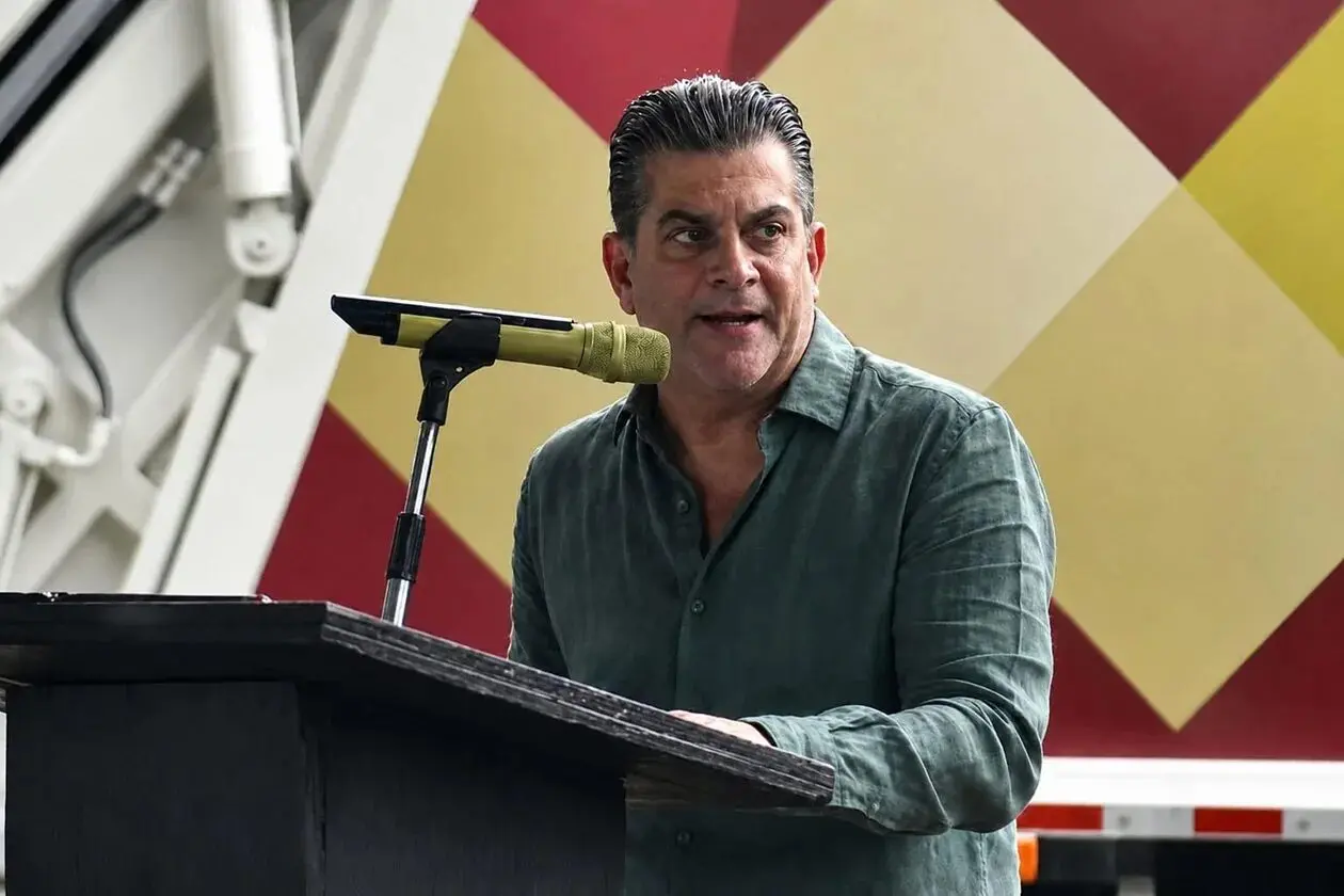 Person speaking at podium with microphone