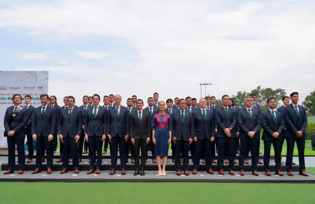 Large group of suited men and one woman