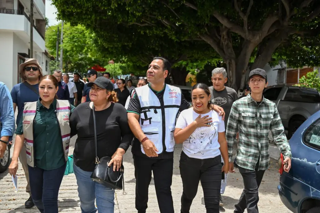 Group walking together on tree-lined city street