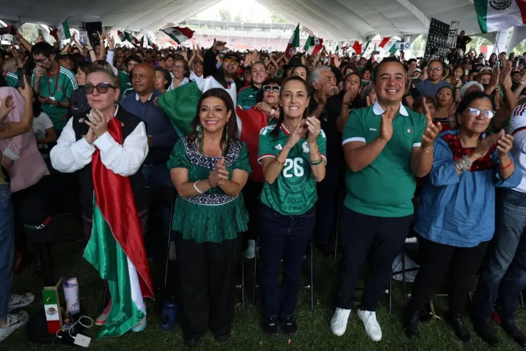 Cheering Mexican fans waving flags
