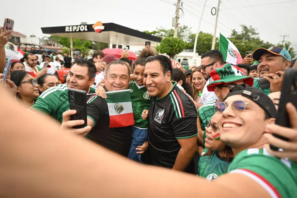 Mexican soccer fans posing for group selfie