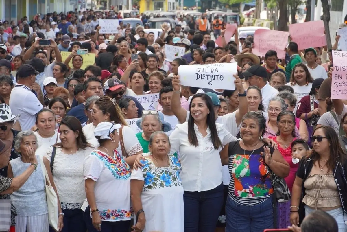 Crowd of women marching with protest signs