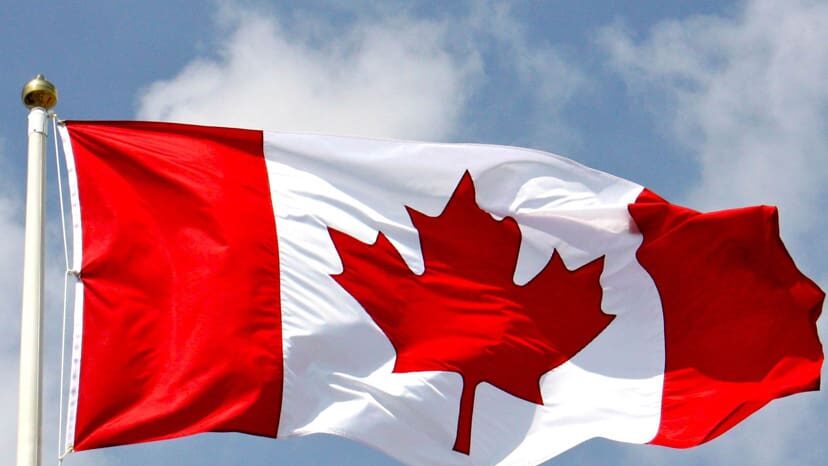 Bandera de Canadá, país que busca estrechar sus vínculos con la Unión Europea.