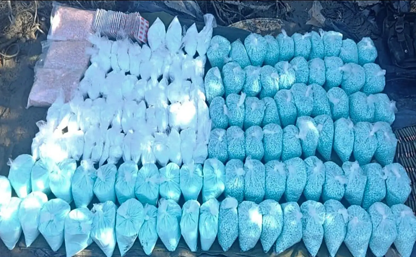 Bags of pills arranged in flag pattern.