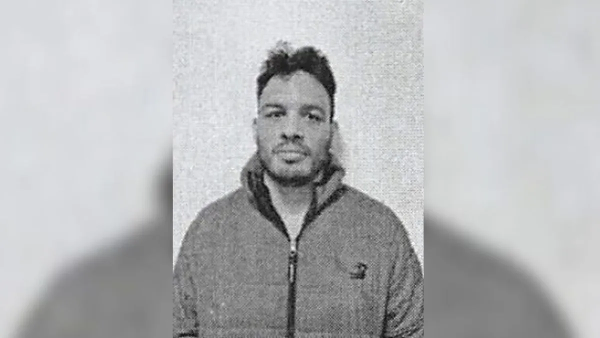 Man wearing a jacket, monochrome image.