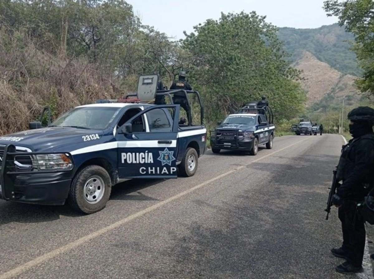 Chiapas police pickup trucks on rural road